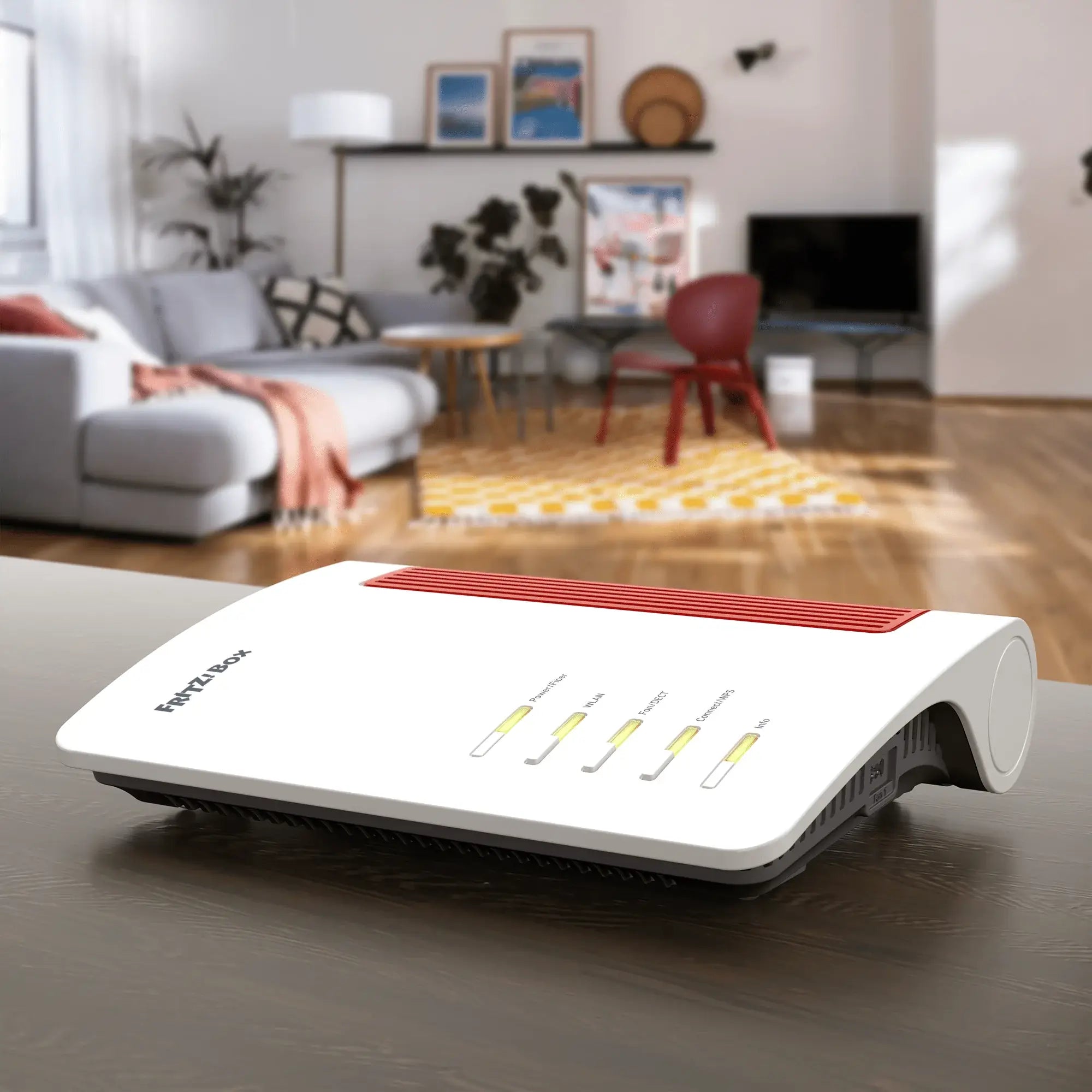 FRITZ!Box 5690 XGS Router auf einem Tisch in modernem Wohnraum, ideal für Highspeed-Internet und smarte Vernetzung.